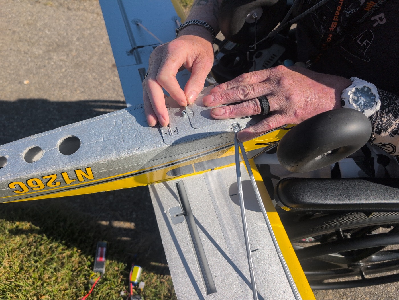 Close up of the plane nose with shark mouth art and big bush wheels